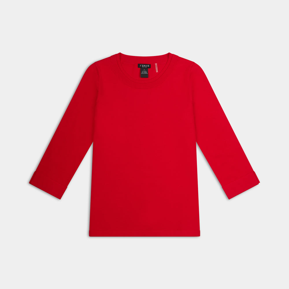 The Gee-Gee Stolen Softness crew neck elbow sleeve knit tee sweater top with clean silhouette, side slit, and shell-colored button detail