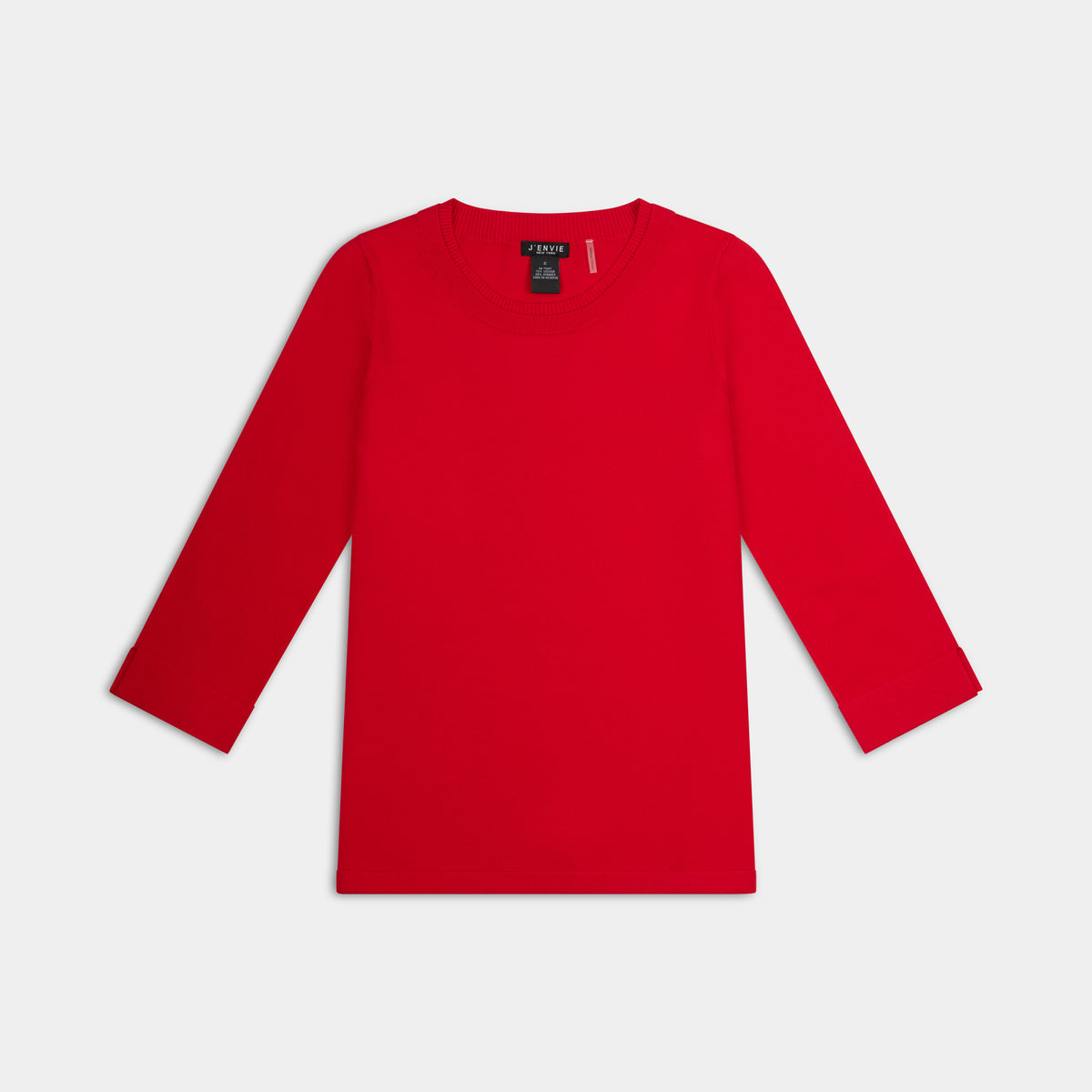 The Gee-Gee Stolen Softness crew neck elbow sleeve knit tee sweater top with clean silhouette, side slit, and shell-colored button detail