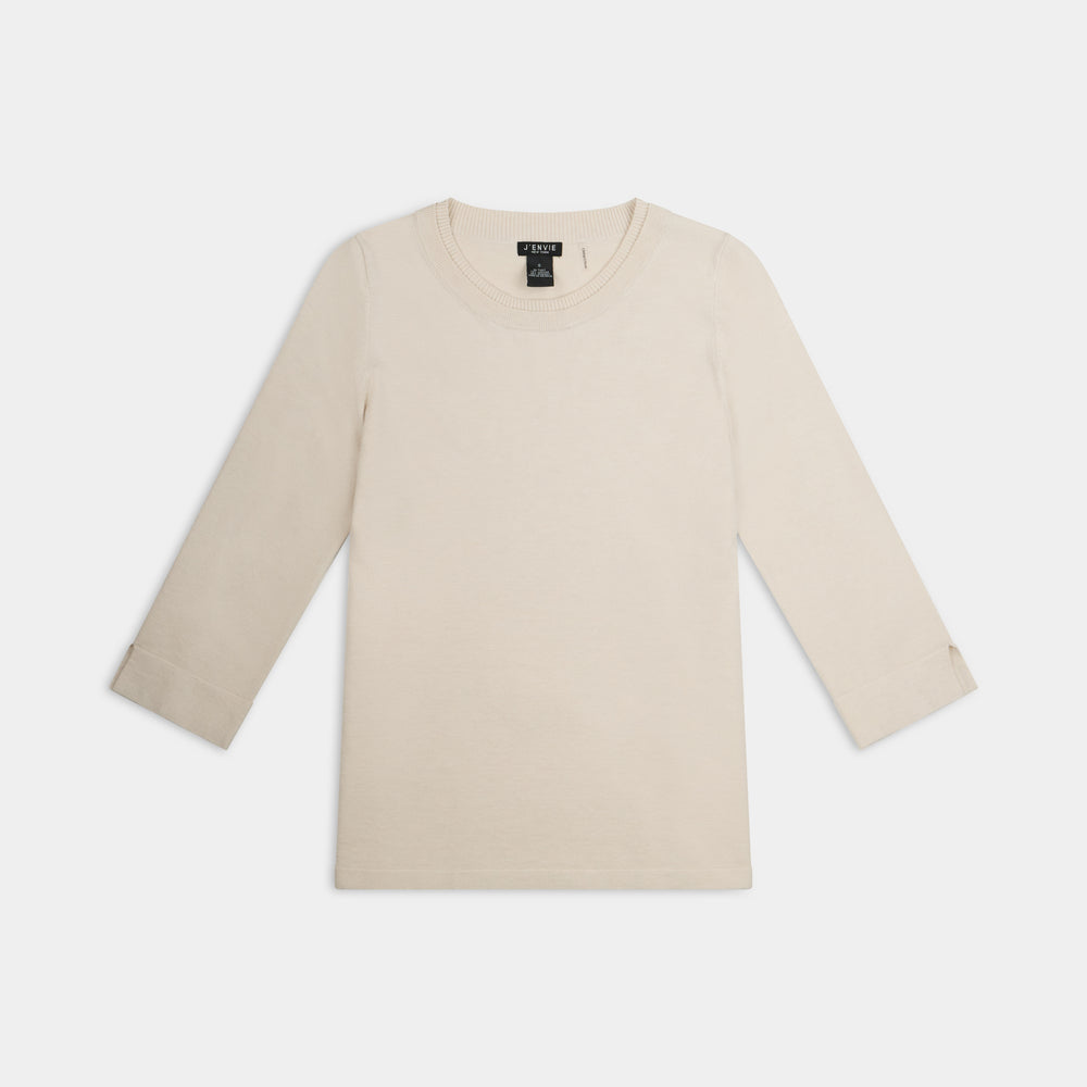 The Gee-Gee Stolen Softness crew neck elbow sleeve knit tee sweater top with clean silhouette, side slit, and shell-colored button detail