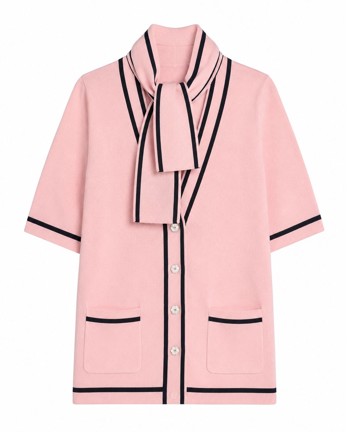 Close-up of The Genoa cotton knit cardigan's romantic tie-neck collar and contrast piping details.