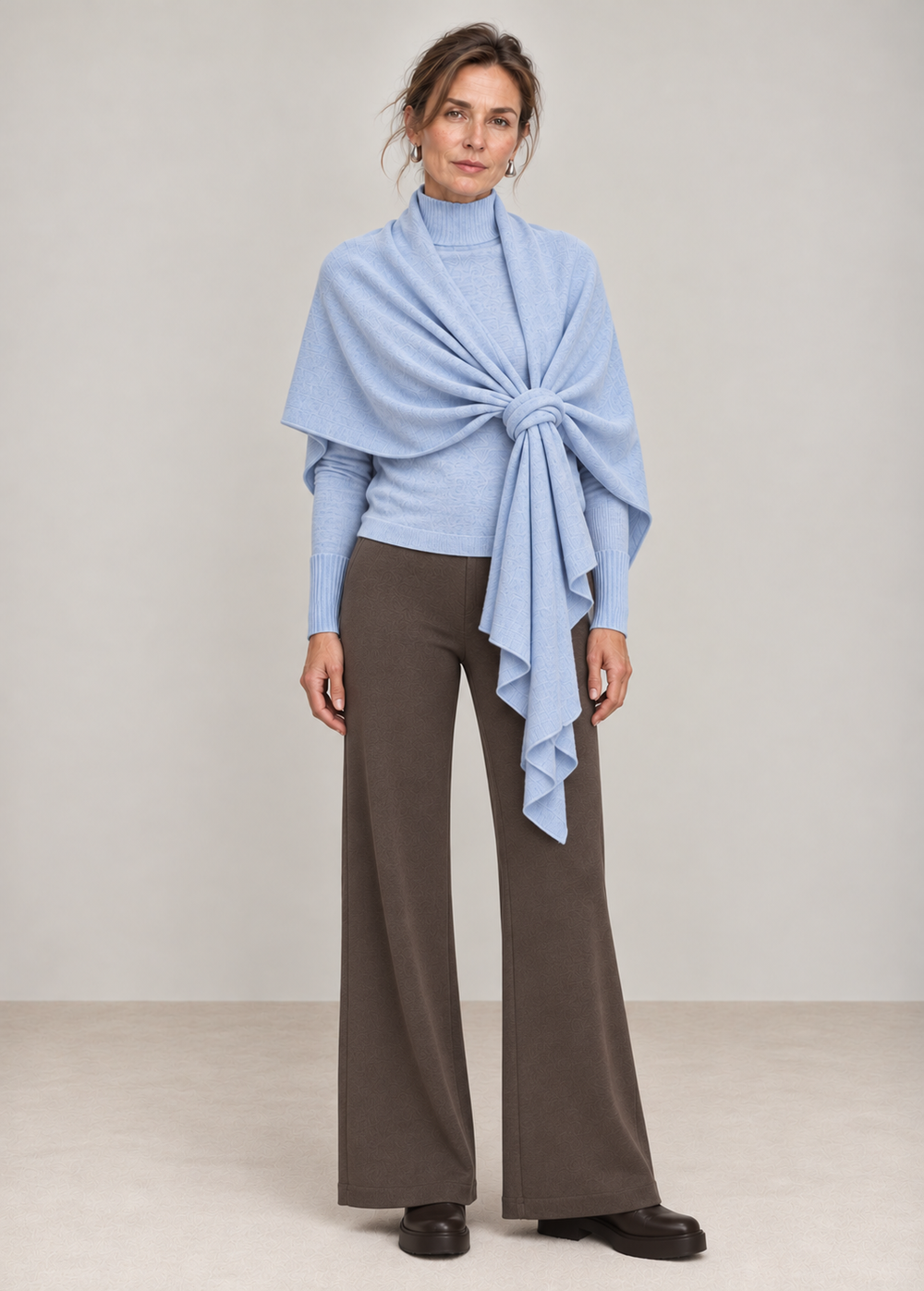 The Rachel Wrap in Sky, knotted over the Terri Mockneck in Sky, with the Lucca pant in Putty