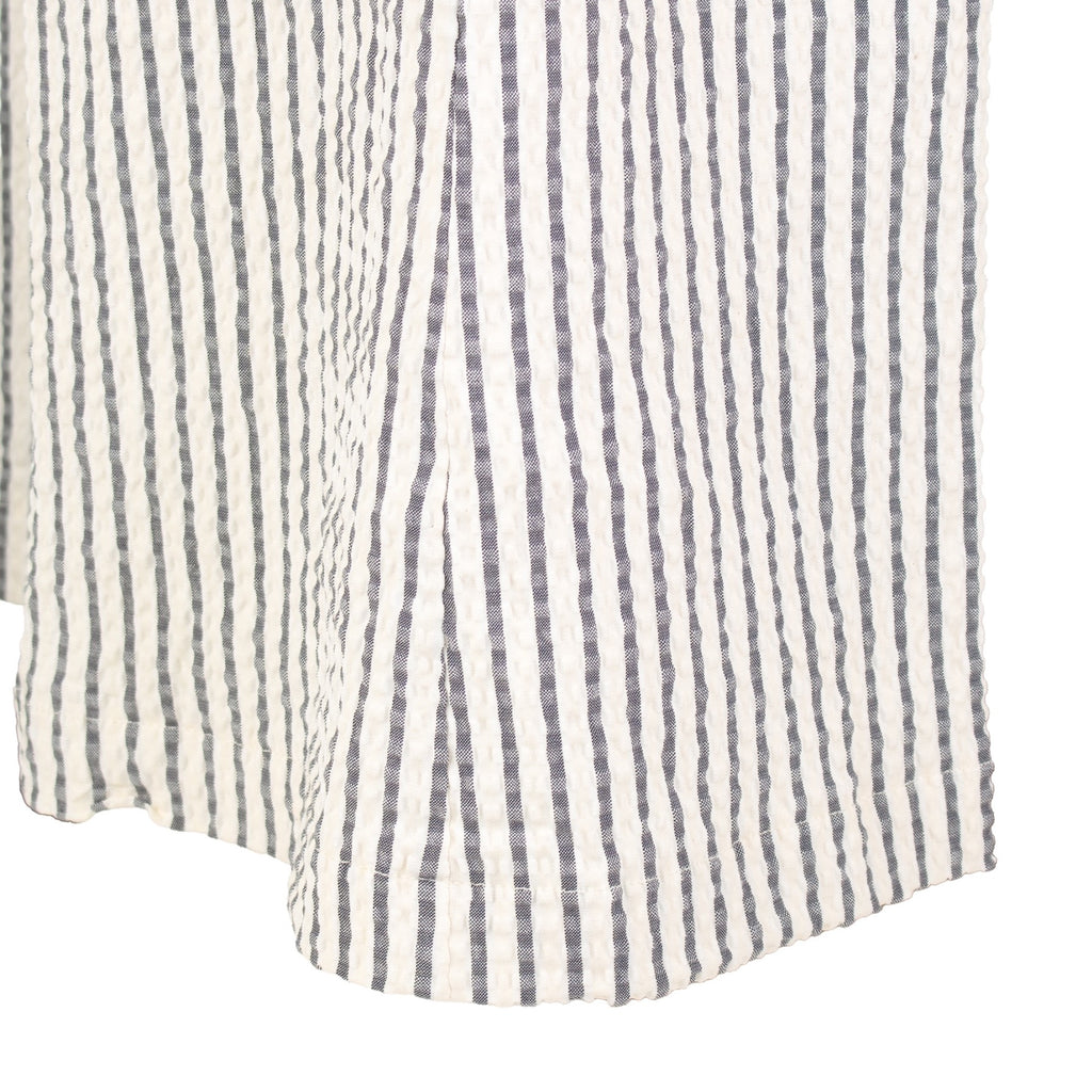 The Como high-rise wide-leg full length Italian seersucker striped stretch pant with curved front pockets and silver button detail