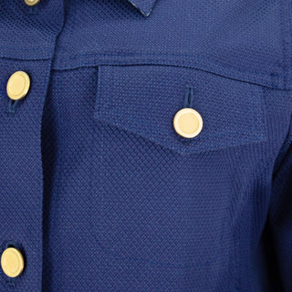 The Lisa Astra fabric stretch collared long sleeve jacket with vibrant floral print, front button closure, and front pocket details