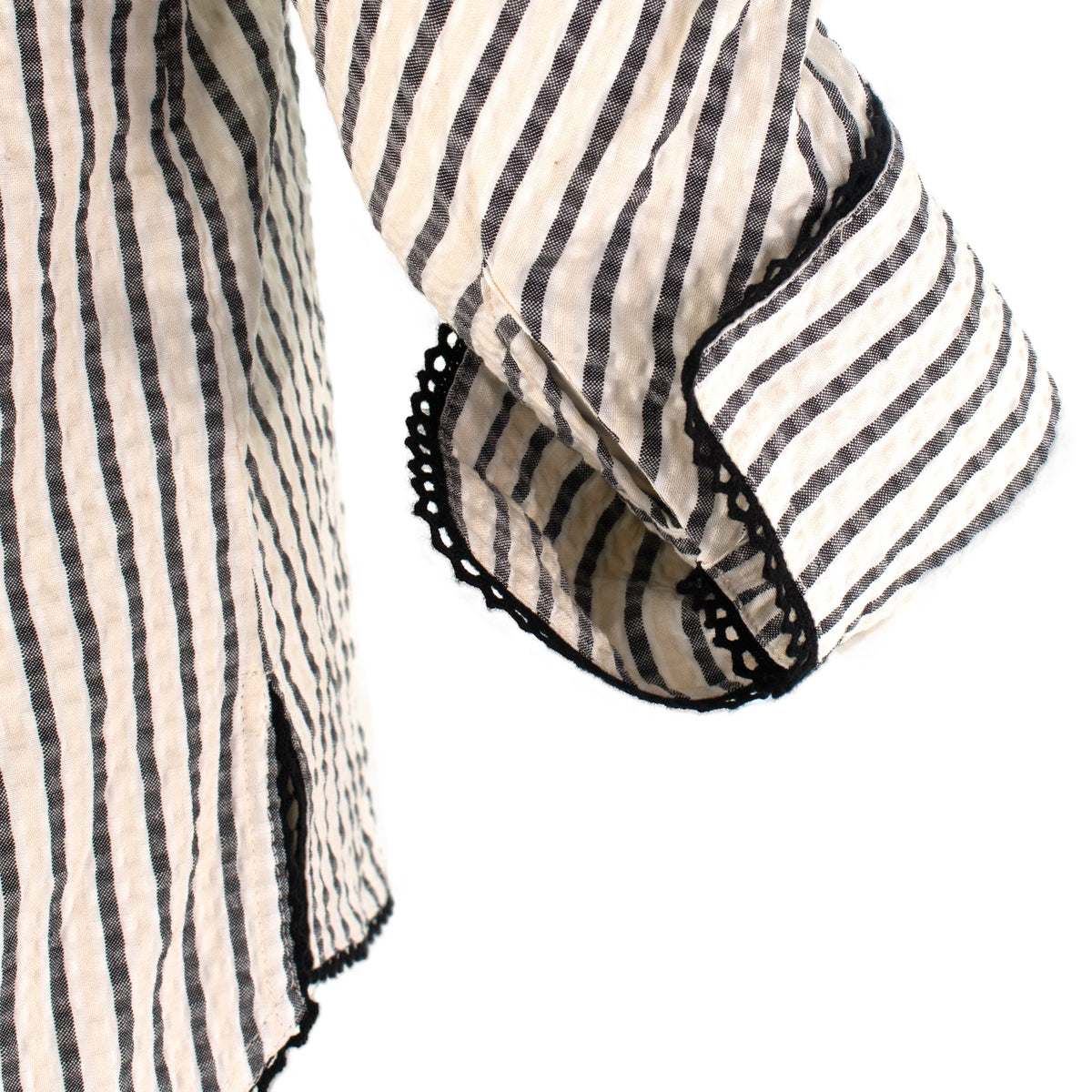 The Ravenna vertical striped collared pop-over tunic top with 3/4 sleeves, button cuffs, and relaxed polished silhouette