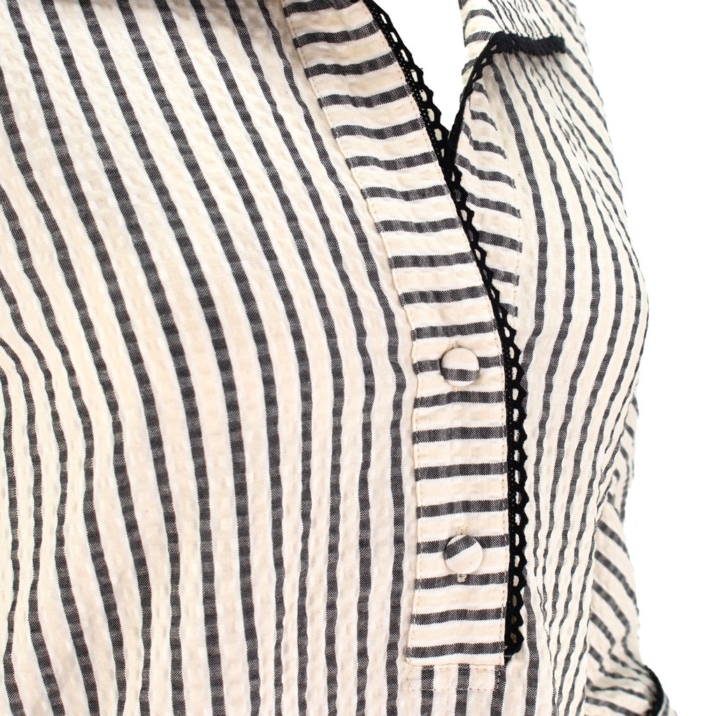 The Ravenna vertical striped collared pop-over tunic top with 3/4 sleeves, button cuffs, and relaxed polished silhouette