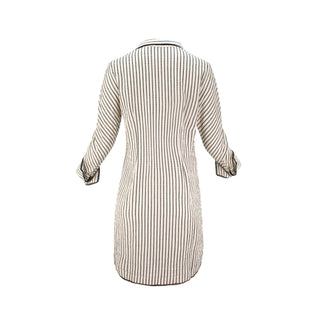The Urbino striped long sleeve collared pop-over shirt dress with vertical stripes, relaxed lapel neckline, contrast black trim detail, and lightweight breathable fabric