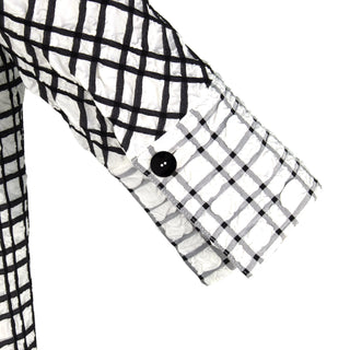 The Brittany striped stretch long sleeve collared pop-over dress with black Akoya buttons