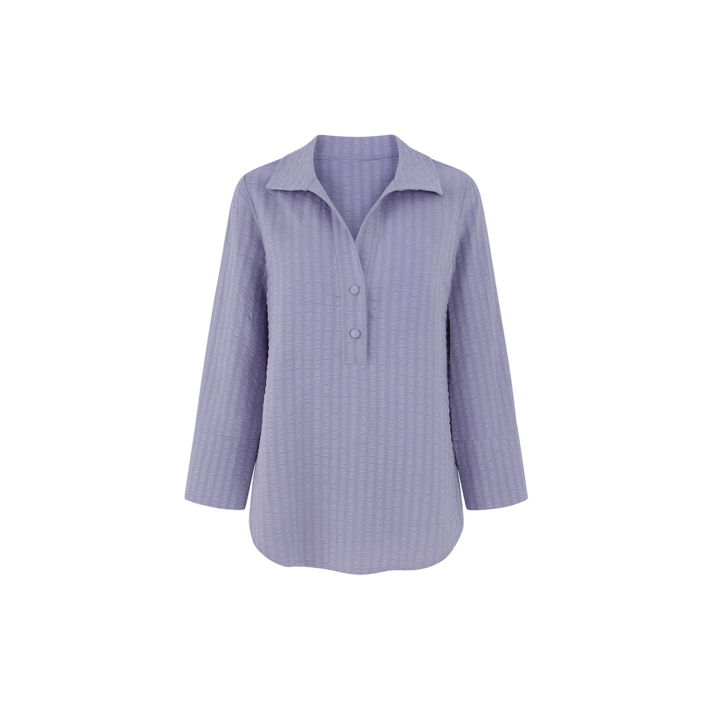 The Gabby Odyssey Check stretch pop-over tunic blouse with textured bubble fabric, collared neckline, long sleeves, front placket, and black Akoya cuff buttons