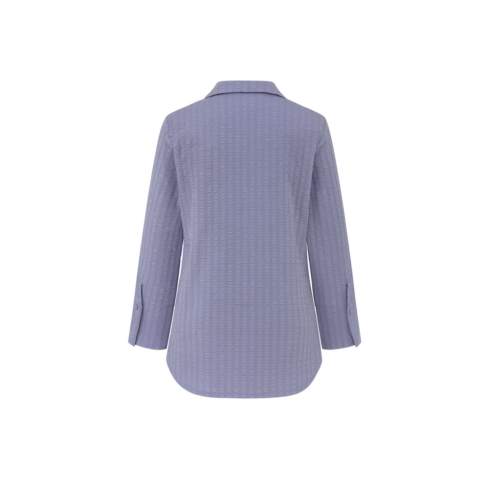 The Gabby Odyssey Check stretch pop-over tunic blouse with textured bubble fabric, collared neckline, long sleeves, front placket, and black Akoya cuff buttons