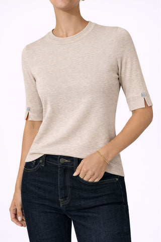 The Gee-Gee Stolen Softness crew neck elbow sleeve knit tee sweater top with clean silhouette, side slit, and shell-colored button detail