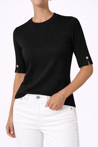 The Gee-Gee Stolen Softness crew neck elbow sleeve knit tee sweater top with clean silhouette, side slit, and shell-colored button detail
