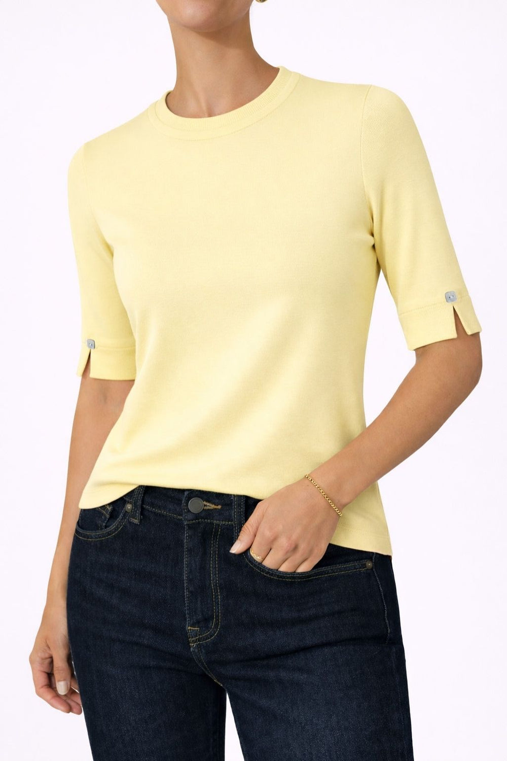 The Gee-Gee Stolen Softness crew neck elbow sleeve knit tee sweater top with clean silhouette, side slit, and shell-colored button detail