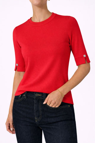 The Gee-Gee Stolen Softness crew neck elbow sleeve knit tee sweater top with clean silhouette, side slit, and shell-colored button detail