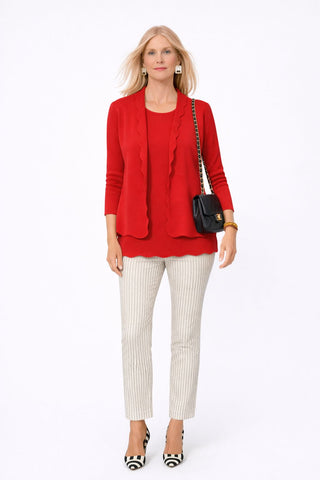 The Thalassa Stolen Softness bolero cardigan jacket with 3/4 sleeves, scalloped edge trim along center front and cuffs, fluid draped silhouette, and softly sculpted knit shape