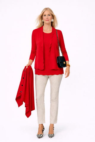 The Thalassa Stolen Softness bolero cardigan jacket with 3/4 sleeves, scalloped edge trim along center front and cuffs, fluid draped silhouette, and softly sculpted knit shape