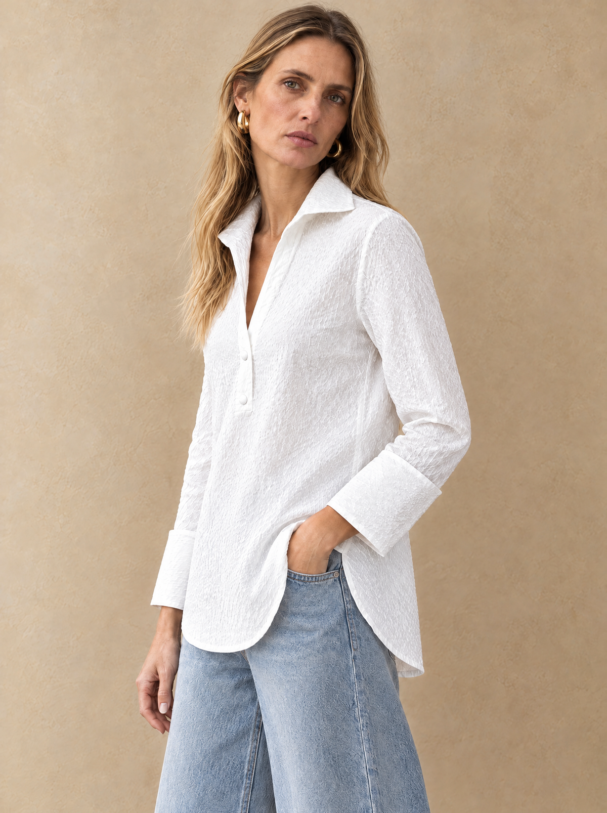 The Delphine Blouse in White, three-quarter view