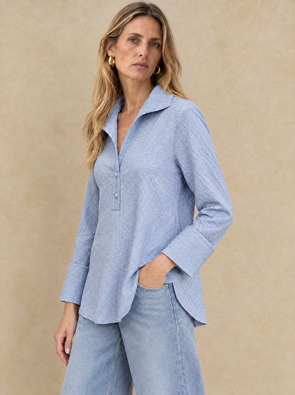 The Delphine Blouse in Chambray, three-quarter view