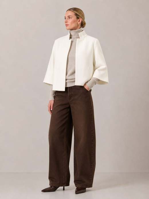 The Bristol Jacket in White over an oatmeal turtleneck