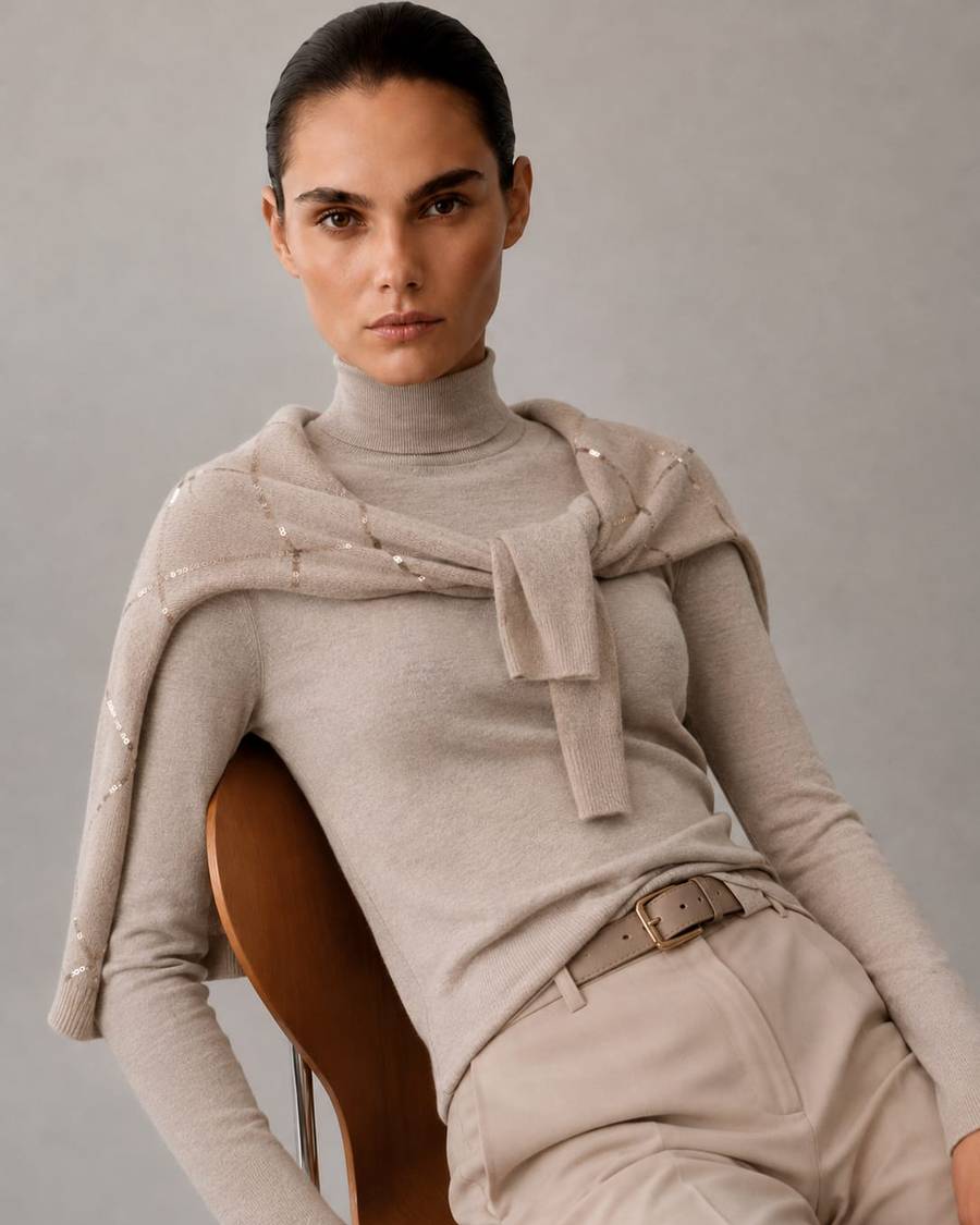 The Talia Turtleneck with the Mayfair Argyle Sweater tied over the shoulders