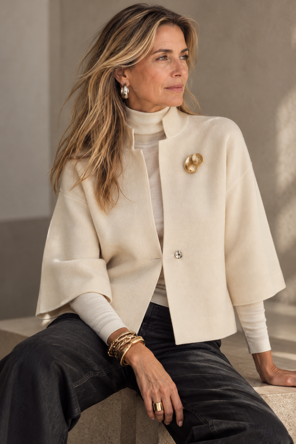 The Bristol Soft Collar Jacket in ivory over the Terri turtleneck in ivory, with black denim